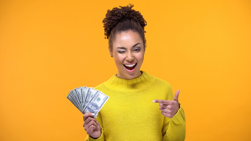 woman happy about payday loan cash